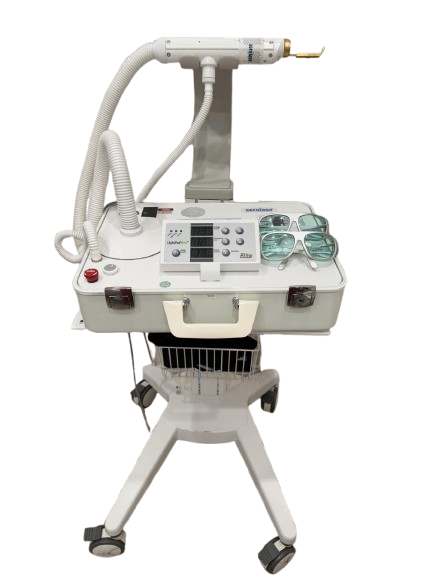 Medical laser device on a wheeled cart with control panel, handpiece, and safety glasses on top.